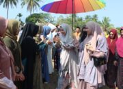 Wakil Ketua TP-PKK Hj. Devriyana Marda Ardian S. Kom. Menghadiri Perayaan Ulang Tahun Desa Tanjung Raja yang ke-105