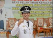 Kades Hanura Rio Remota: Urip Iku Urup Kiasan Bahasa Dalam Menata Pemerintahan Desa.