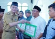 Pj. Bupati Pringsewu Adi Erlansyah, Serahkan Bantuan Rumah Ibadah & Lembaga Keagamaan