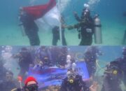 TNI AL Kibarkan Bendera Merah Putih di Bawah Laut Pulau Putri Kepulauan Seribu
